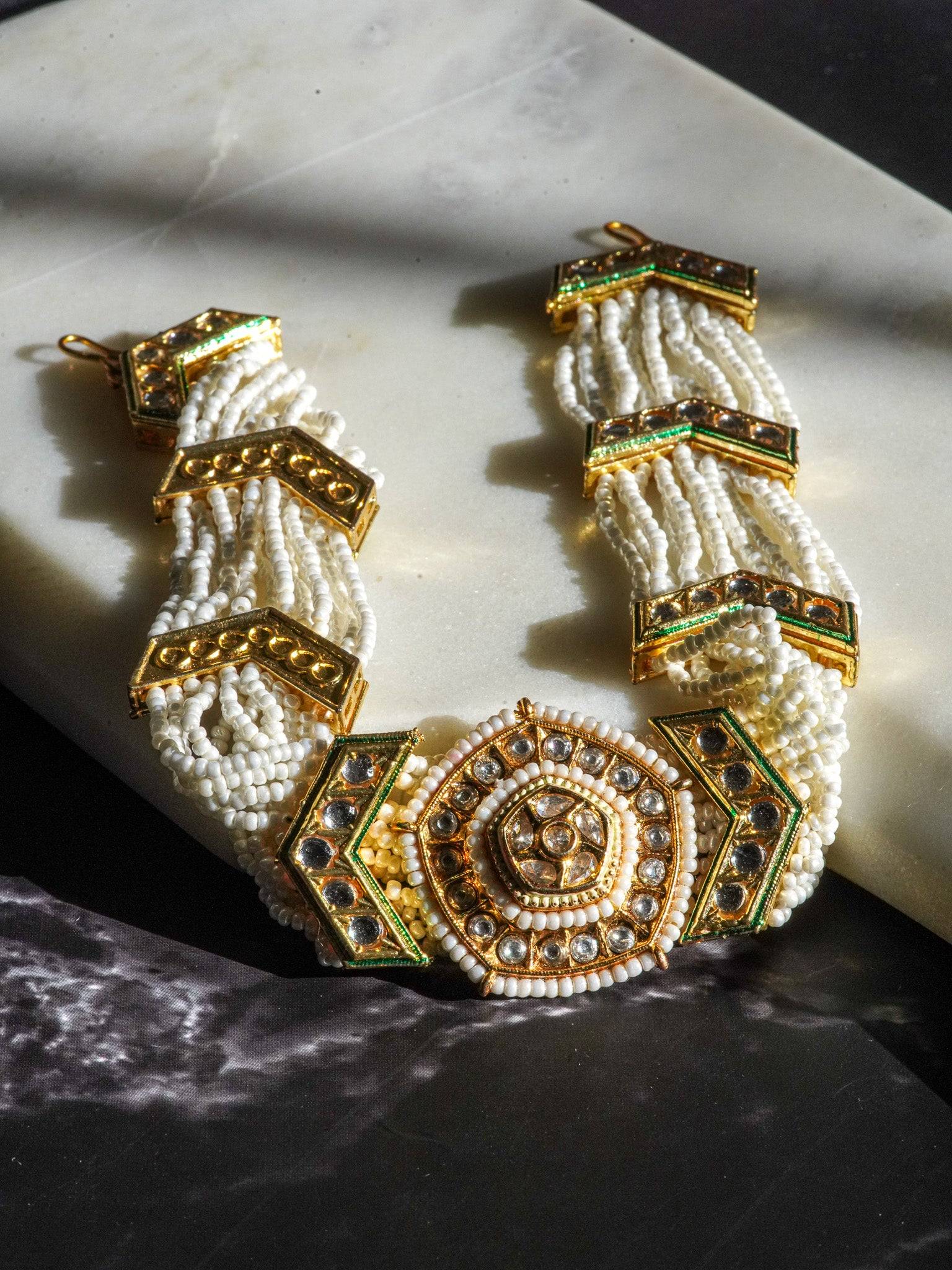 Gold moissanite polki mathapatti with ivory beading for Indian jewelry wear from Inaury