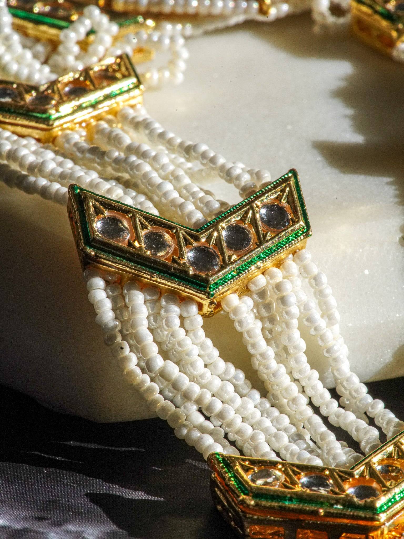 Gold moissanite polki mathapatti with ivory beading for Indian jewelry wear from Inaury