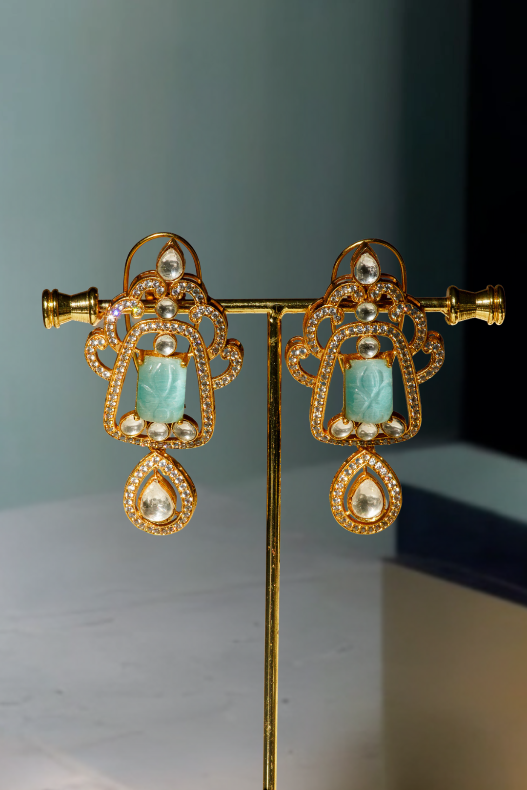 Siham Indian bridal jewelry set with moissanite polki stones, gold plating, turquoise centerpiece, and green accents