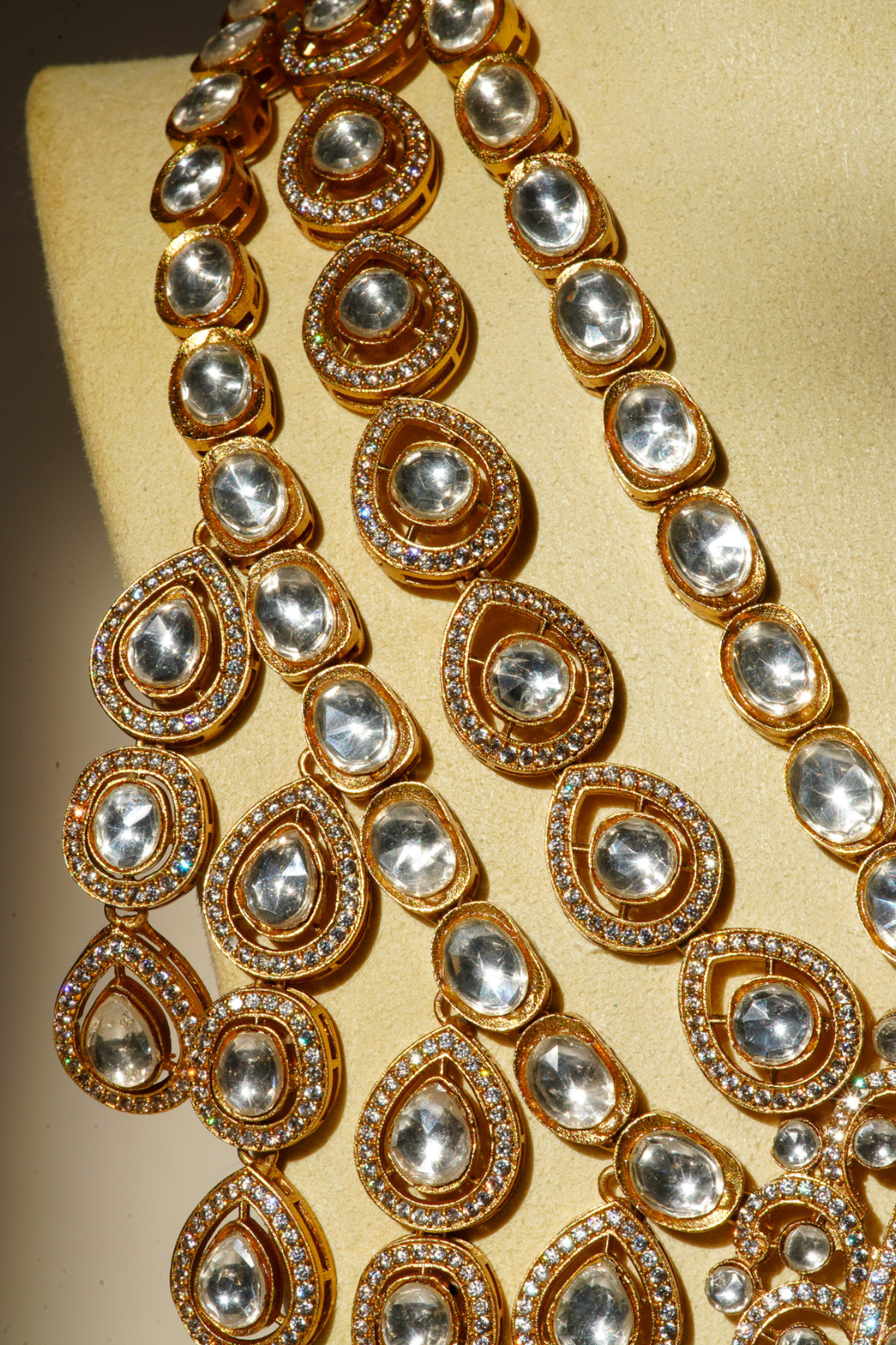 Siham Indian bridal jewelry set with moissanite polki stones, gold plating, turquoise centerpiece, and green accents