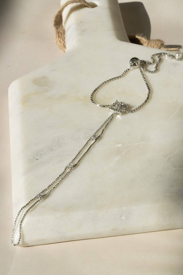 Soraya hand chain bracelet in silver with cubic stones