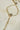 Soraya hand chain bracelet in gold plating with cubic stones