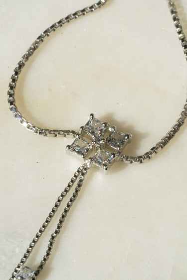 Soraya hand chain bracelet in silver with cubic stones