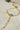 Soraya hand chain bracelet in gold plating with cubic stones