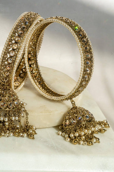 Antique mehendi gold bangle set with reverse AD stones and jhumka tassels from Inaury