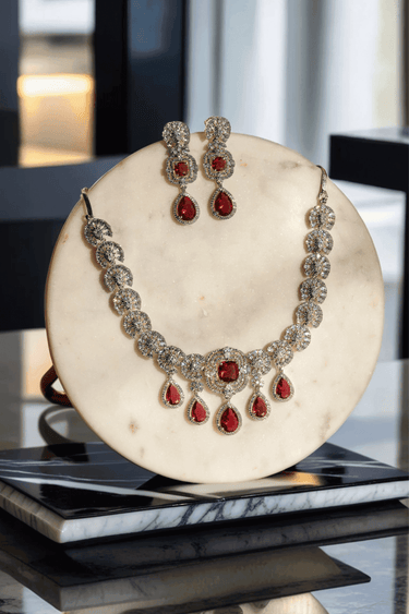 Aneesha Diamante Accent AD Necklace Set - Rhodium-finished with emerald green, maroon, or dusty pink accents, featuring a statement necklace and matching earrings.
