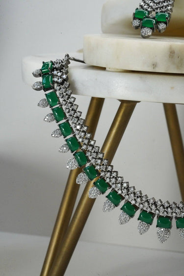 Close-up of green Anjam Black Plated AD Necklace Set, emphasizing the detailed CZ stone arrangement and black plating.