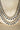 Arni Long Double Layer Diamanté AD Necklace Set - Rhodium-plated silver finish with intricate detailing, available in five colors, includes matching statement earrings.