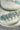 Jhanvi Choker Necklace Set - Silver & Gem Variations featuring cushion-cut AD stones with mint green teardrop accents, includes matching earrings.