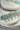 Jhanvi Choker Necklace Set - Silver & Gem Variations featuring cushion-cut AD stones with mint green teardrop accents, includes matching earrings.