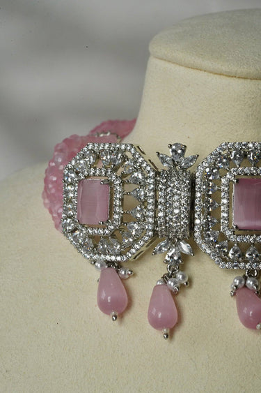 Jhanvi Choker Necklace Set - Silver & Gem Variations featuring cushion-cut AD stones with pink teardrop accents, includes matching earrings.