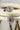 Jhanvi Choker Necklace Set - Silver & Gem Variations featuring cushion-cut AD stones with ruby teardrop accents, includes matching earrings.