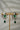 Jhanvi Choker Necklace Set - Silver & Gem Variations featuring cushion-cut AD stones with green teardrop accents, includes matching earrings.