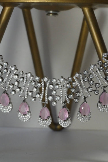 Krippa Black Plated AD Necklace Set - Black-plated, tarnish-resistant finish with dazzling AD stones, available in four colors: black-oxidized & blue, black-oxidized & purple, black-oxidized & pink, and black-oxidized & yellow.