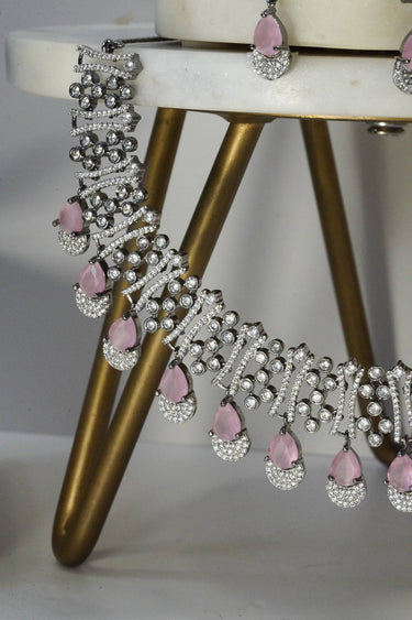 Krippa Black Plated AD Necklace Set - Black-plated, tarnish-resistant finish with dazzling AD stones, available in four colors: black-oxidized & blue, black-oxidized & purple, black-oxidized & pink, and black-oxidized & yellow.