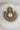 Laila Chandbali Earring in antique gold with circular patterns, white stones, and pearl detailing, placed on white marble.