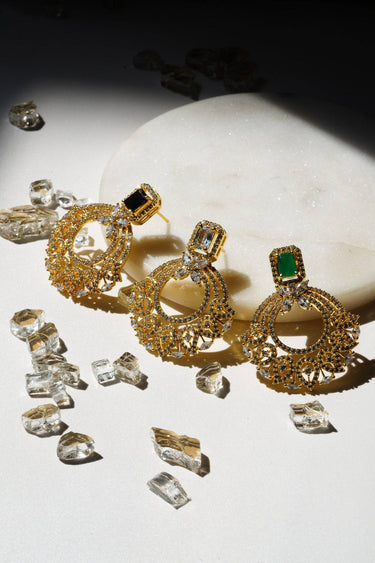 Three variations of The Mia - Dainty Chandbali Earrings with CZ Stones in black, white, and green, elegantly arranged with crystal decor.