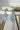 Mirah AD Earrings - Elegant Jewelry featuring blue teardrop stones and CZ accents, ideal for elegant evening looks.