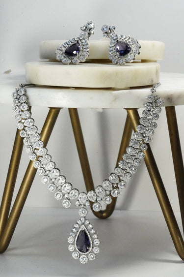 Mirah AD Necklace Set - Elegant Jewelry with purple teardrop pendant and earrings, featuring CZ stones in classic style.