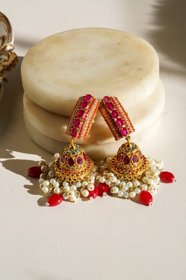 Navdeep Jhumka Earrings - Handcrafted with antique gold plating, available in ruby, blue, or gold, featuring multi-color stones and embellishments.