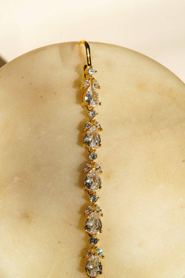 Nila Diamanté Accent Golden AD Maang Tikka - Gold-plated with teardrop stones and diamante accents, available in gold & multicolor or gold & white.