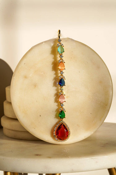 Nila Diamanté Accent Golden AD Maang Tikka - Gold-plated with teardrop stones and diamante accents, available in gold & multicolor or gold & white.