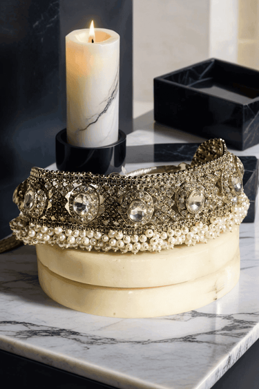 Detailed view of Rimmie Artisan Crafted Choker with large zircon stones and pearl trim, styled for Pakistani formal wear.