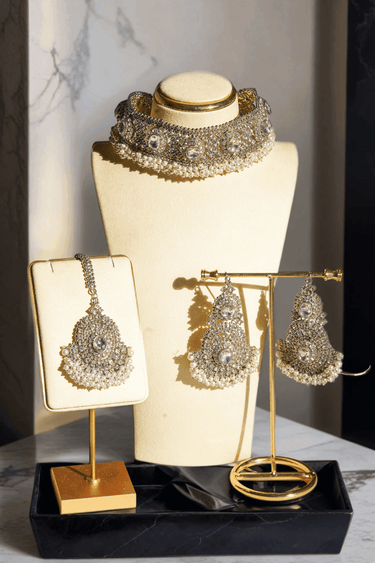 Rimmie Artisan Crafted Choker Set in silver with zircon stones and pearls, displayed on a mannequin for jewelry e-commerce showcase.