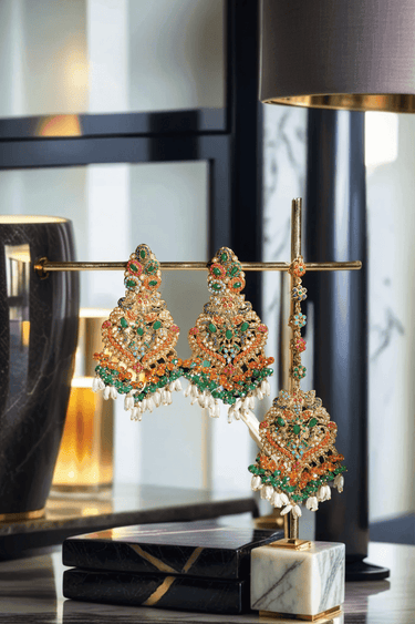 Sarah Chandelier Earrings & Maang Tikka Set - Gold-plated with multi-color stones, featuring 3.5-inch chandelier earrings and a maang tikka.