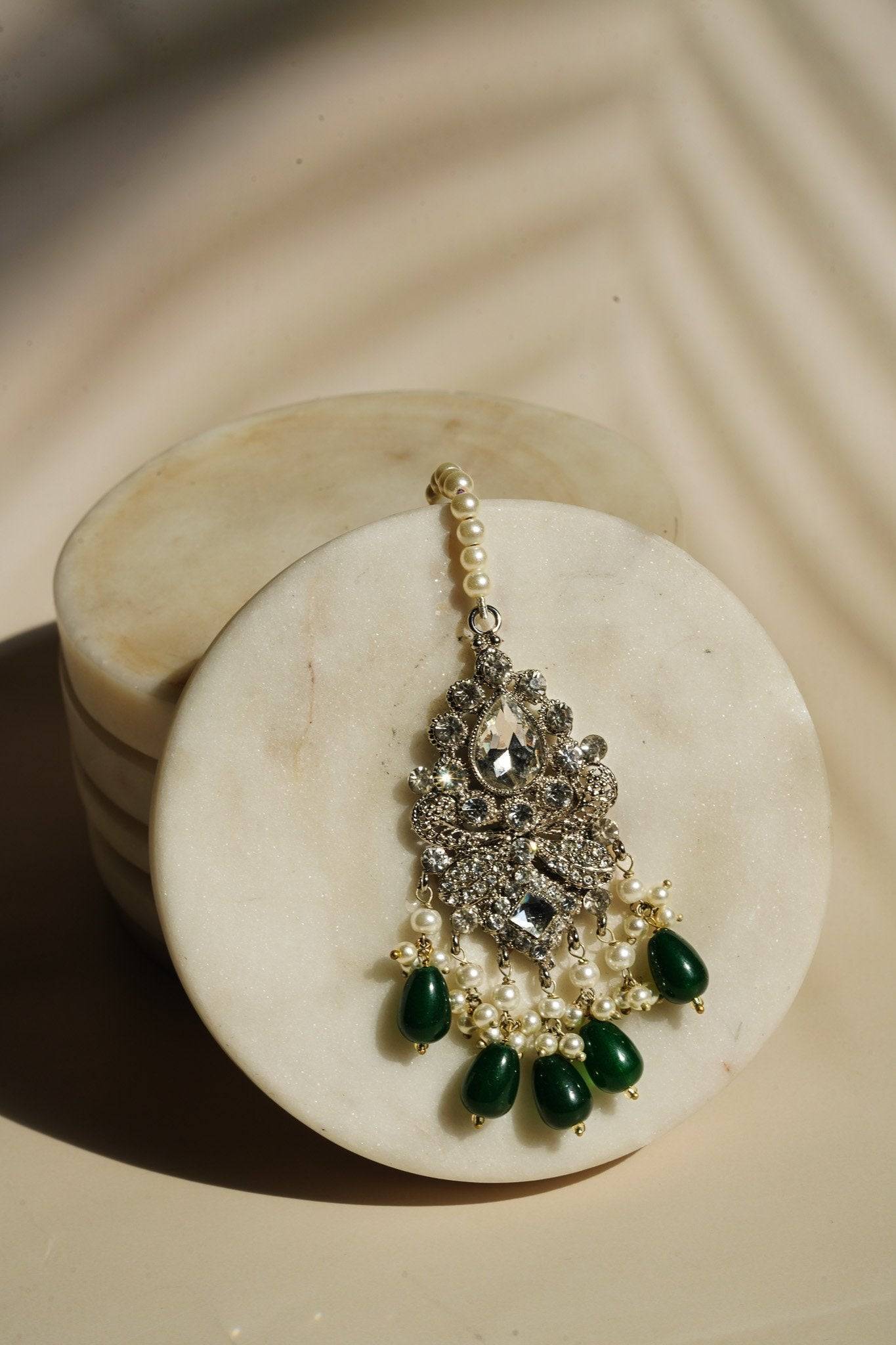 Sareena - Silver and Green Necklace Set with Earrings, Maang Tikka and Jhoomer Optional Choker Necklace Set from Inaury