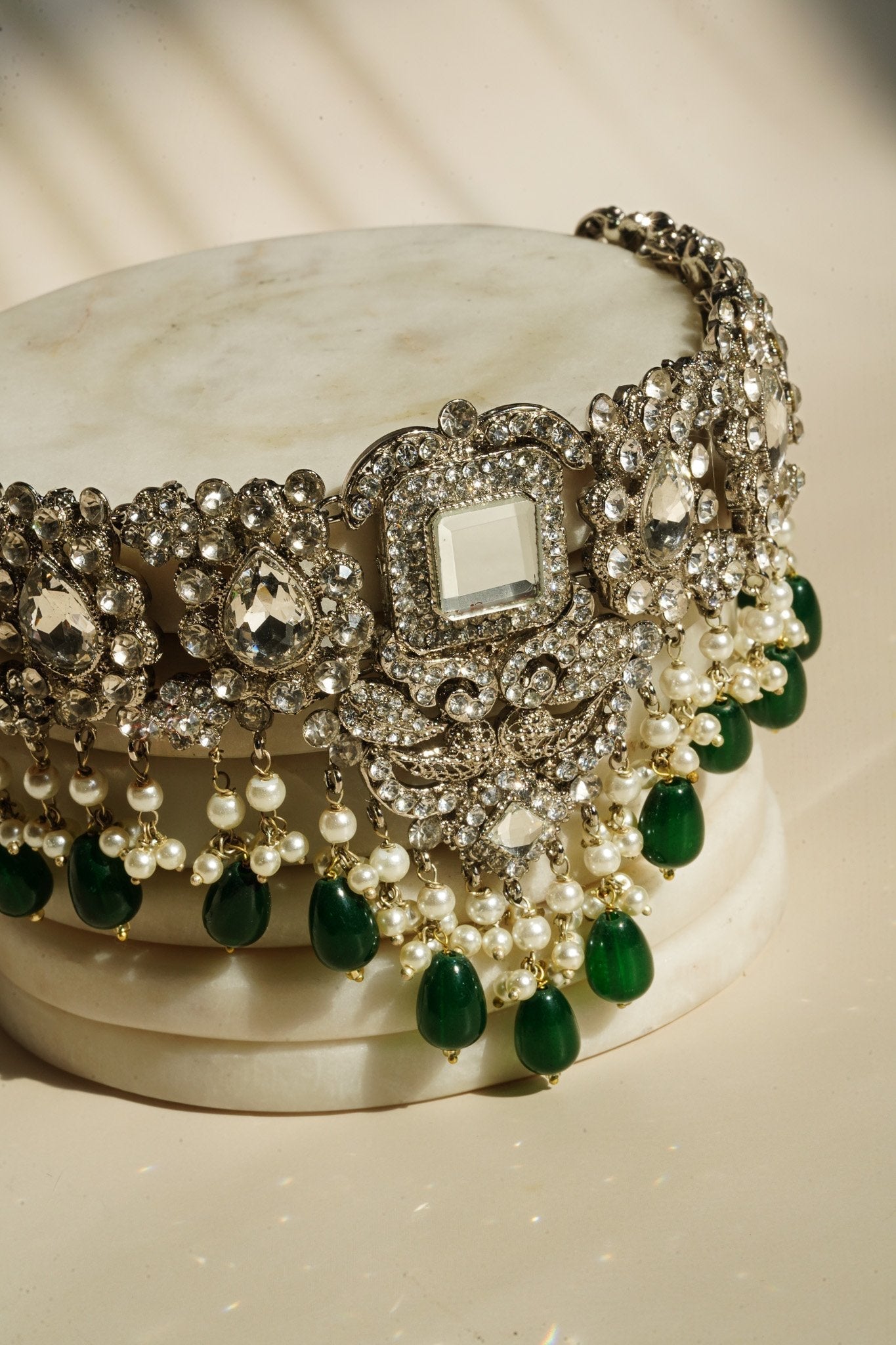 Sareena - Silver and Green Necklace Set with Earrings, Maang Tikka and Jhoomer Optional Choker Necklace Set from Inaury