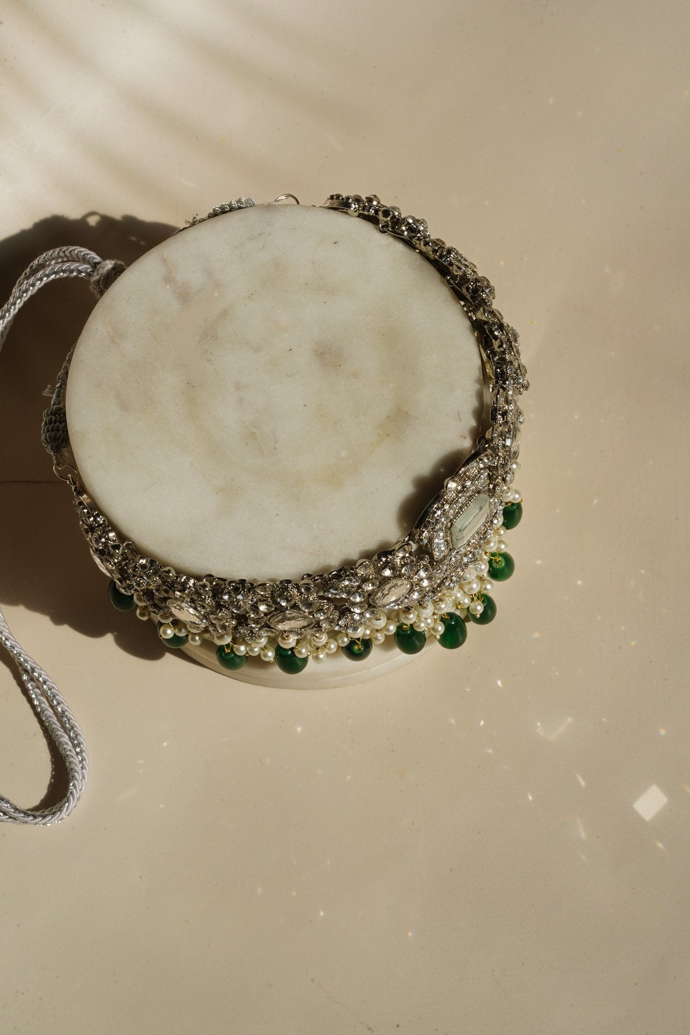 Sareena - Silver and Green Necklace Set with Earrings, Maang Tikka and Jhoomer Optional Choker Necklace Set from Inaury