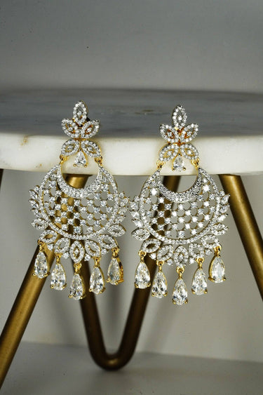 Siya AD Chandbali Earrings - Available in rhodium or gold plating with white AD stones, featuring a 2.5-inch drop, perfect for a statement piece.