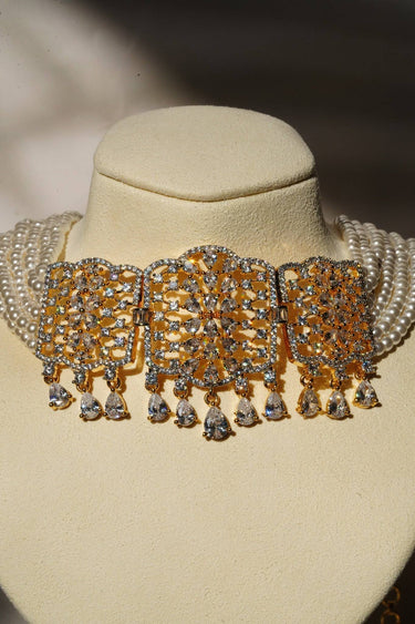 Sumra Choker Necklace with faux pearl strands and cubic zirconia centerpiece. Elegant jewelry for weddings and special occasions.