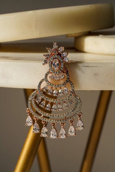 Single rose gold Mim chandbali earring with cascading teardrop CZ stones and floral top design for a refined look.