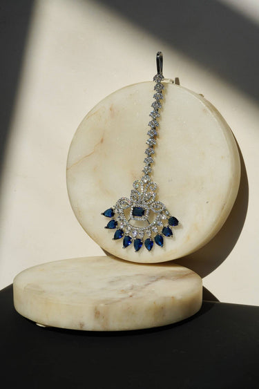 Inaury Isata oversized rhodium-plated maang tikka with sapphire blue and white AD stones – South Asian bridal headpiece