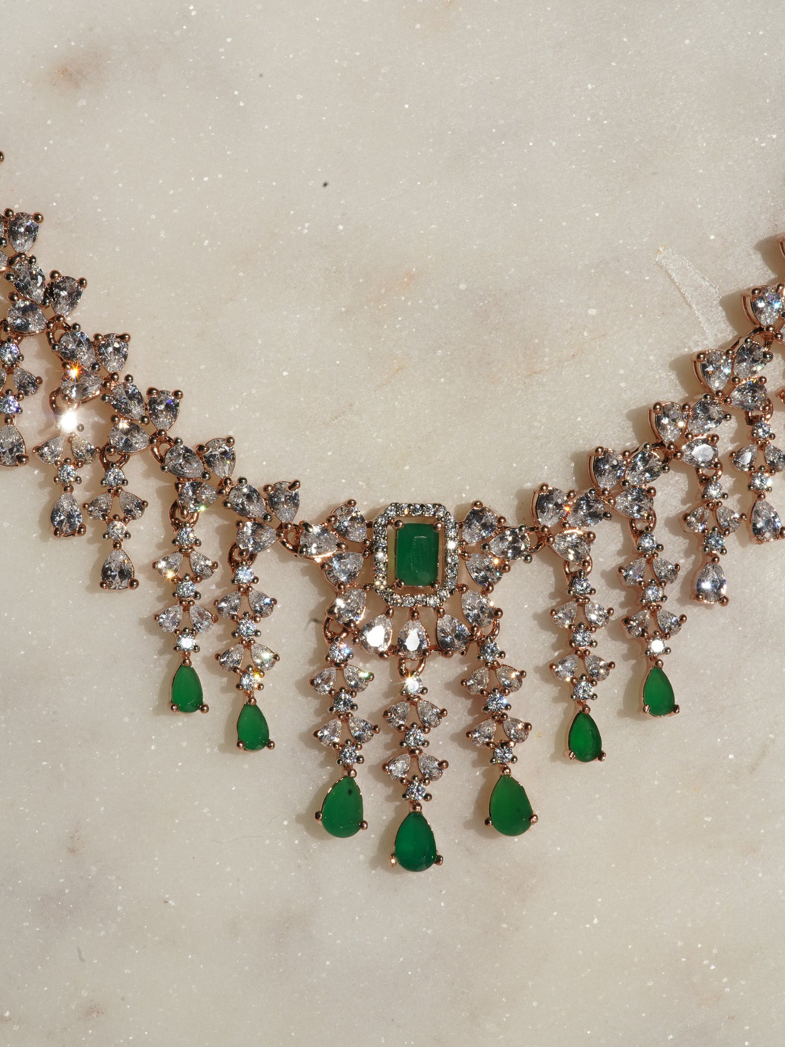 Anne Diamante Accent AD Necklace Set - Rose gold plated with cascading design, featuring diamante accent AD stones and matching dainty earrings, available in rose gold & white, rose gold & pink, rose gold & green, rose gold & sapphire blue, and rose gold & maroon.