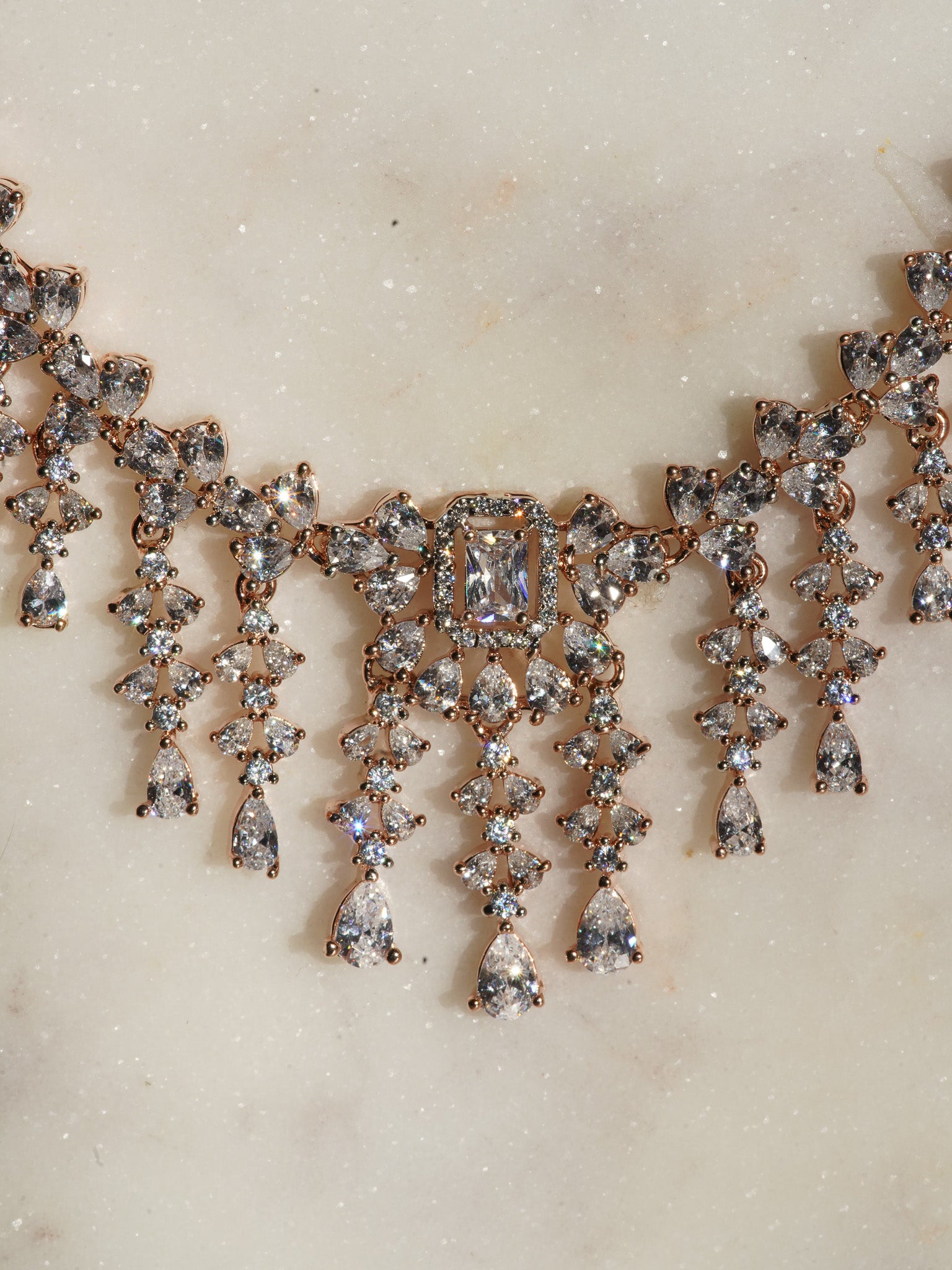 Anne Diamante Accent AD Necklace Set - Rose gold plated with cascading design, featuring diamante accent AD stones and matching dainty earrings, available in rose gold & white, rose gold & pink, rose gold & green, rose gold & sapphire blue, and rose gold & maroon.