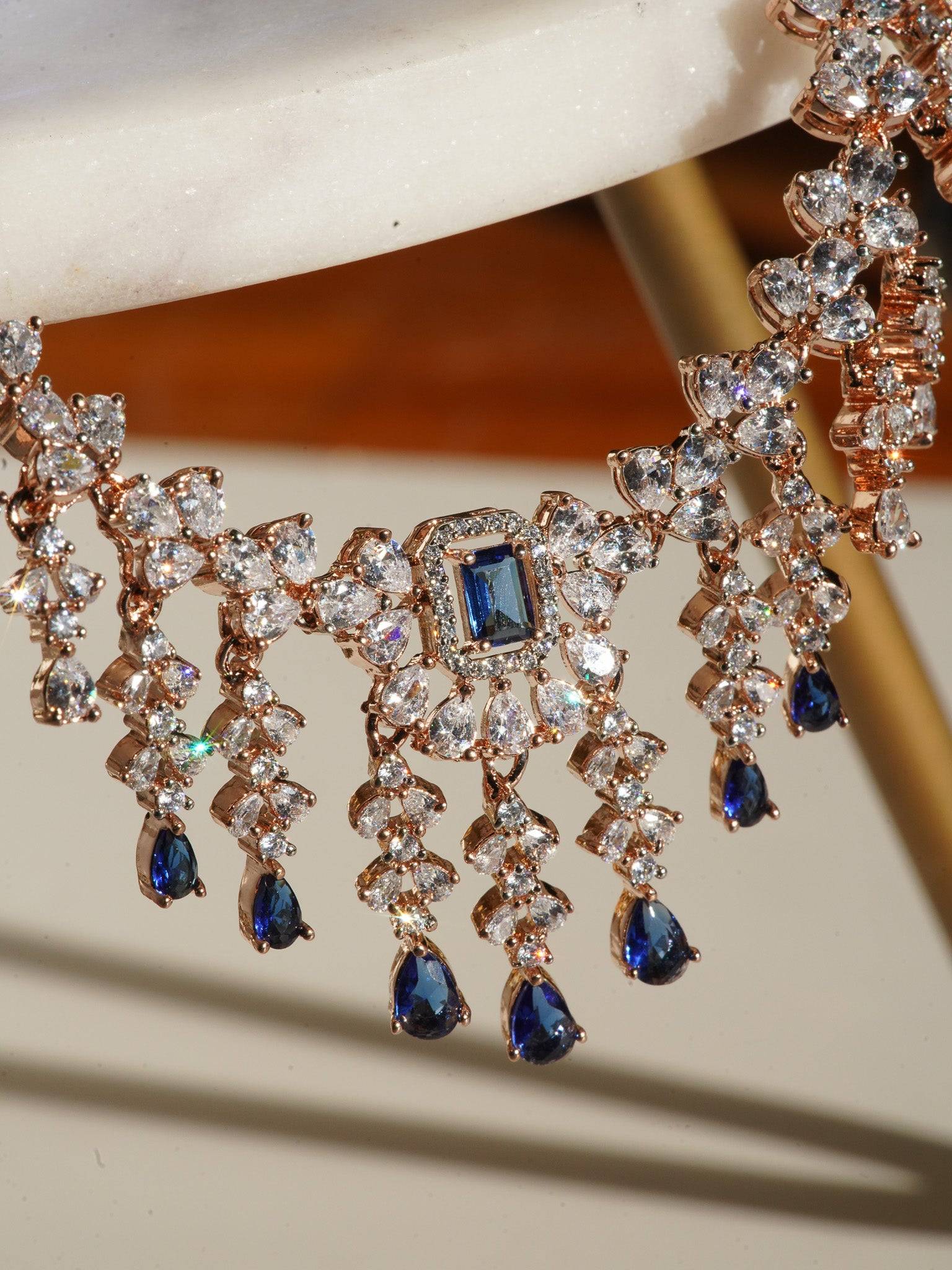 Anne Diamante Accent AD Necklace Set - Rose gold plated with cascading design, featuring diamante accent AD stones and matching dainty earrings, available in rose gold & white, rose gold & pink, rose gold & green, rose gold & sapphire blue, and rose gold & maroon.