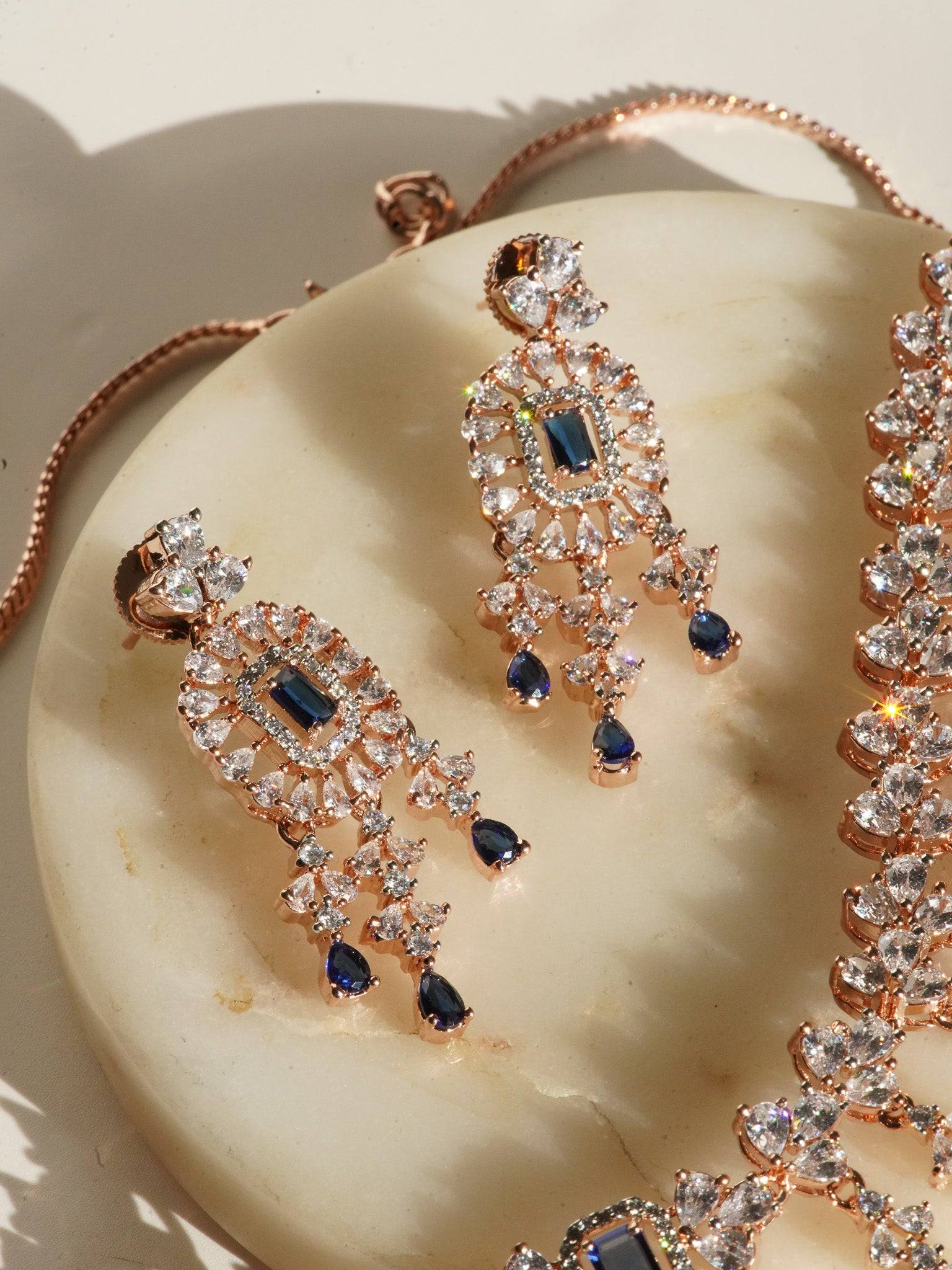 Anne Diamante Accent AD Necklace Set - Rose gold plated with cascading design, featuring diamante accent AD stones and matching dainty earrings, available in rose gold & white, rose gold & pink, rose gold & green, rose gold & sapphire blue, and rose gold & maroon.