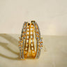 Elegant gold hoop earrings featuring pavé set AD stones