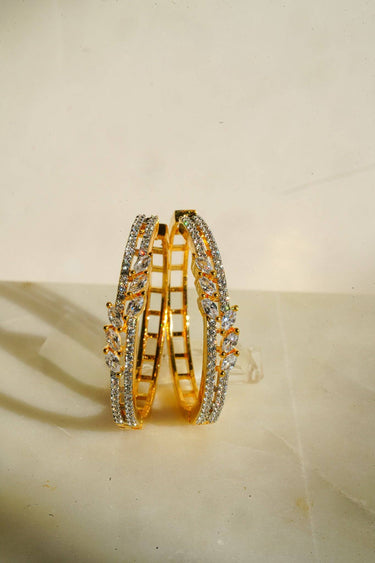 Elegant gold hoop earrings featuring pavé set AD stones