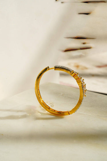 Chic gold earrings showcasing intricate marquise and AD design