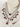 Priya Diamante Bridal Set - Rhodium-plated silver with maroon accents, including cascading necklace and intricate floral choker with matching earrings.