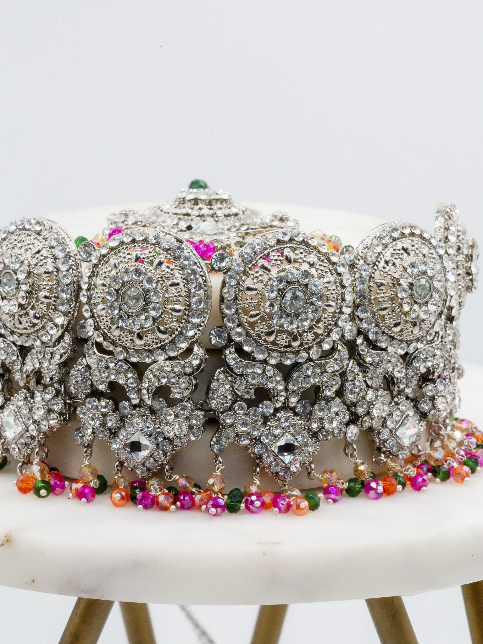 Detailed view of silver Namar Choker Necklace Set with colorful beads and ornate CZ stonework.