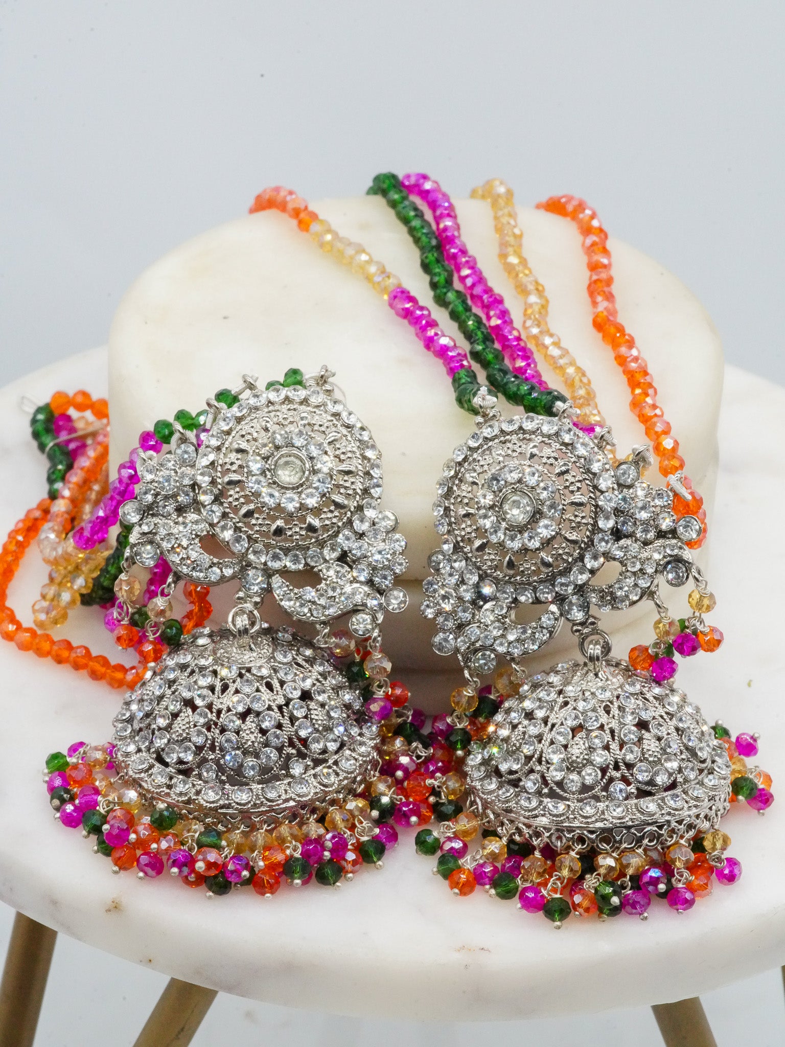 Close-up of multicolor beaded earrings from Namar Choker Necklace Set with intricate CZ stone design.