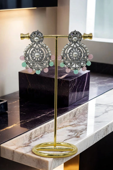 Pair of Navya Black Plated Chandbali Earrings with shimmering stones and multicolored beads, ideal for ethnic jewelry collections.