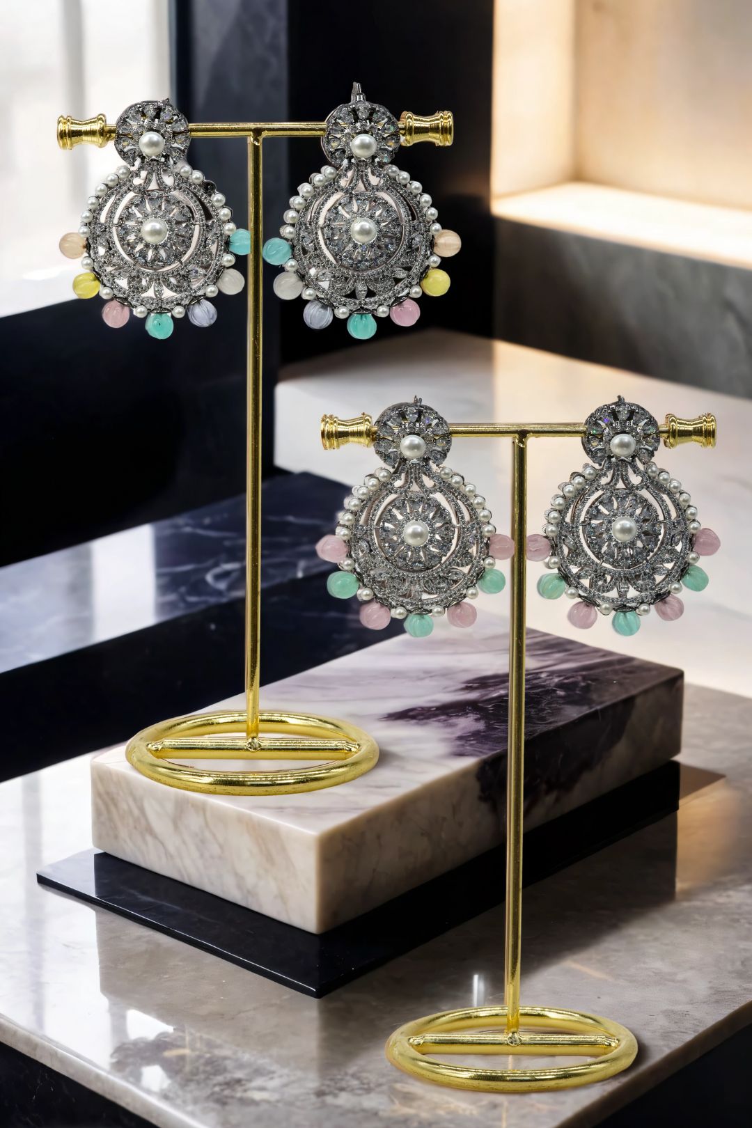Navya Black Plated Chandbali Earrings with pearls and multicolored beads on gold stands, ideal for festive and wedding wear.