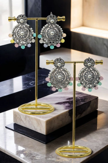 Navya Black Plated Chandbali Earrings with pearls and multicolored beads on gold stands, ideal for festive and wedding wear.