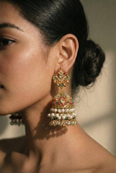 Juhi matte gold plated multicolor jhumka earrings with zircon stones